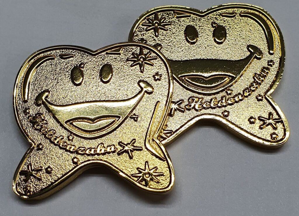 coins Heldenzahn